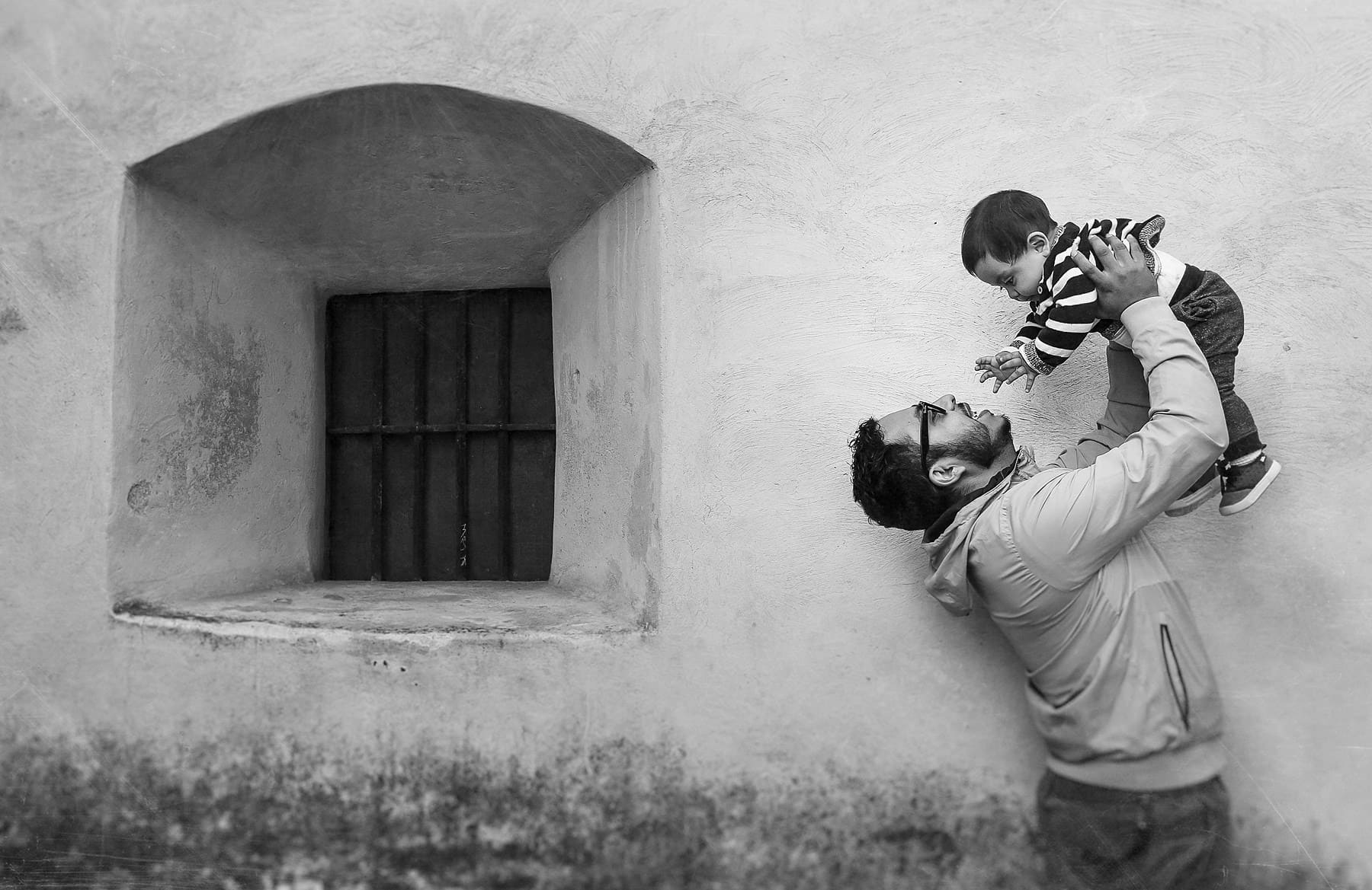 Black and white father and son portraits. Jhankarlo Photography