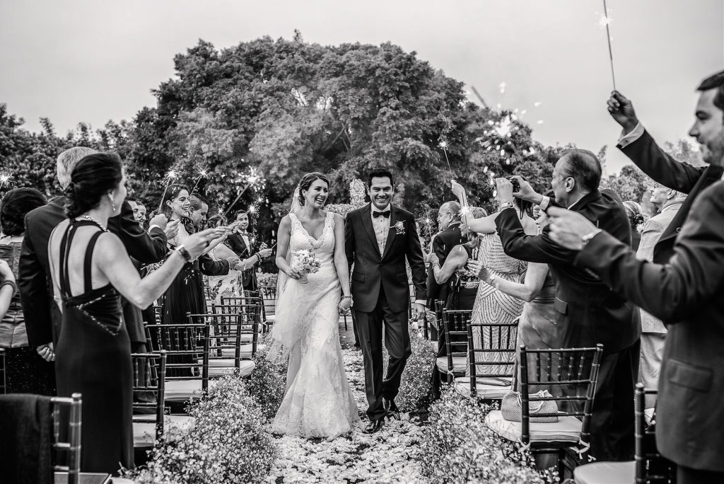 Bride and groom exit at Camino Real Sumiya Wedding in Cuernavaca, Mexico. Jhankarlo Photography